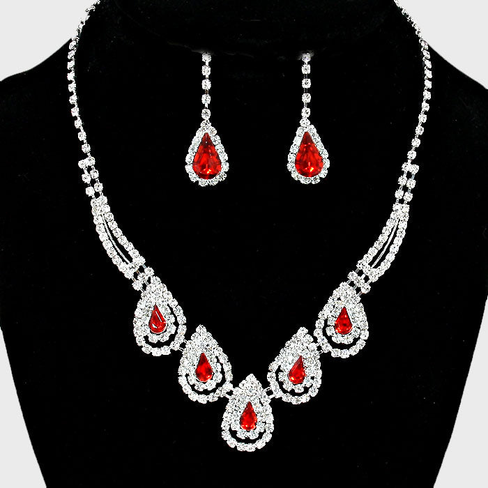 Pierced silver clear and red stone teardrop necklace and earring set