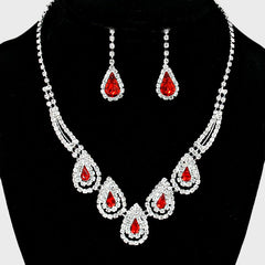 Pierced silver clear and red stone cutout teardrop necklace and earring set