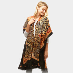 Black, brown multi colored 100% polyester multi animal print shawl poncho