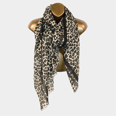 Black, blue, pink, gray leopard pattern scarf with strip and frayed edges