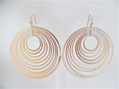 Pierced matte gold lightweight cutout circle earrings