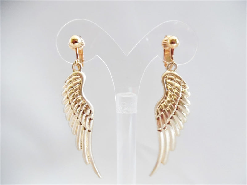 Clip on gold indented dangle wing earrings