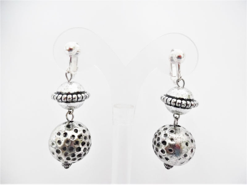 Clip on matte silver and black dangle indented ball earrings