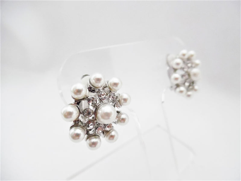 Clip on 1" silver white pearl and clear stone cutout earrings