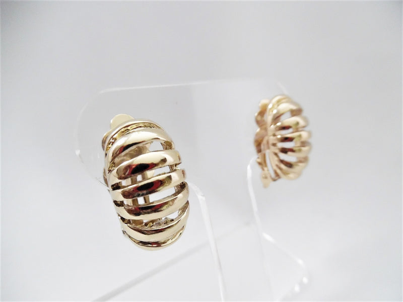 Clip on 1" gold cutout bent button style earrings