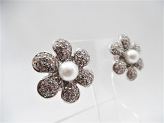 Clip on silver round edge cutout pearl and clear stone button style earrings