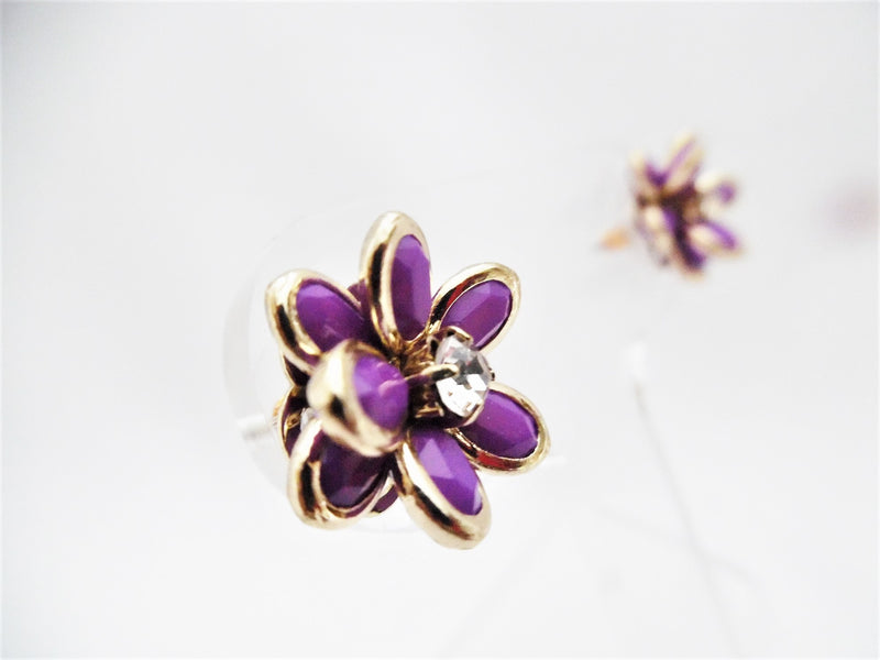 Pierced 3/4" gold and purple stone flower earrings with center clear stone