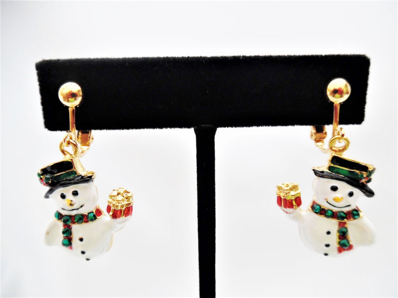 Clip on 1 1/2" gold, white and black dangle snowman earrings with broom