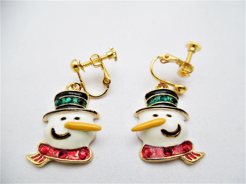 Clip on gold, white multi colored long nose dangle snowman earrings