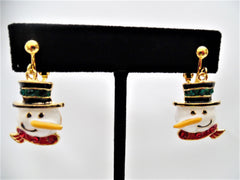 Clip on gold, white multi colored long nose dangle snowman earrings