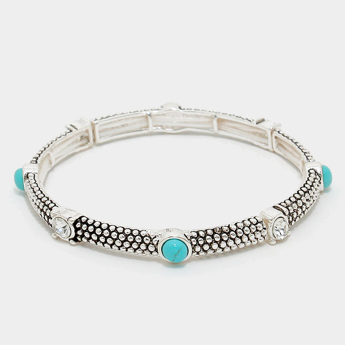 Western stretch 7" silver textured turquoise and clear stone bracelet